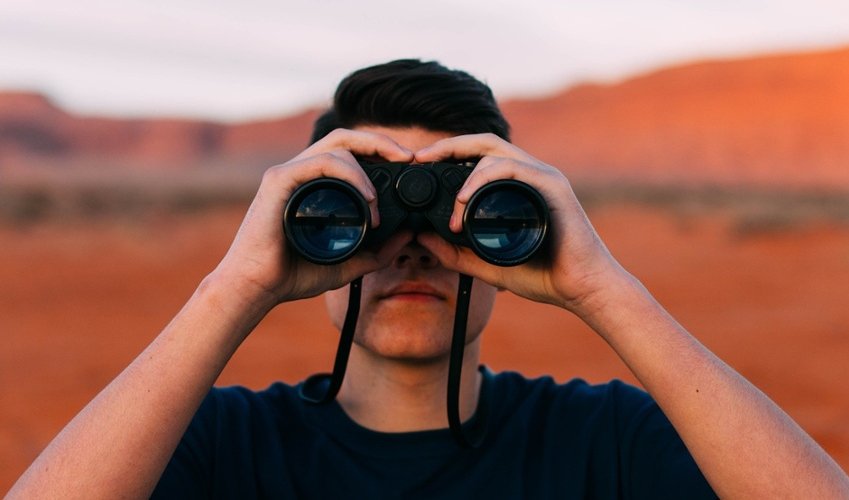 Man with binoculars